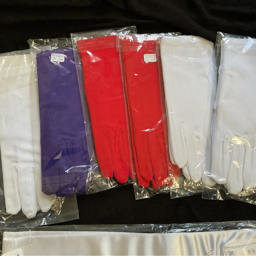 END RUN (11) Pair Gloves: White, Red, Silver and Purple Gloves.